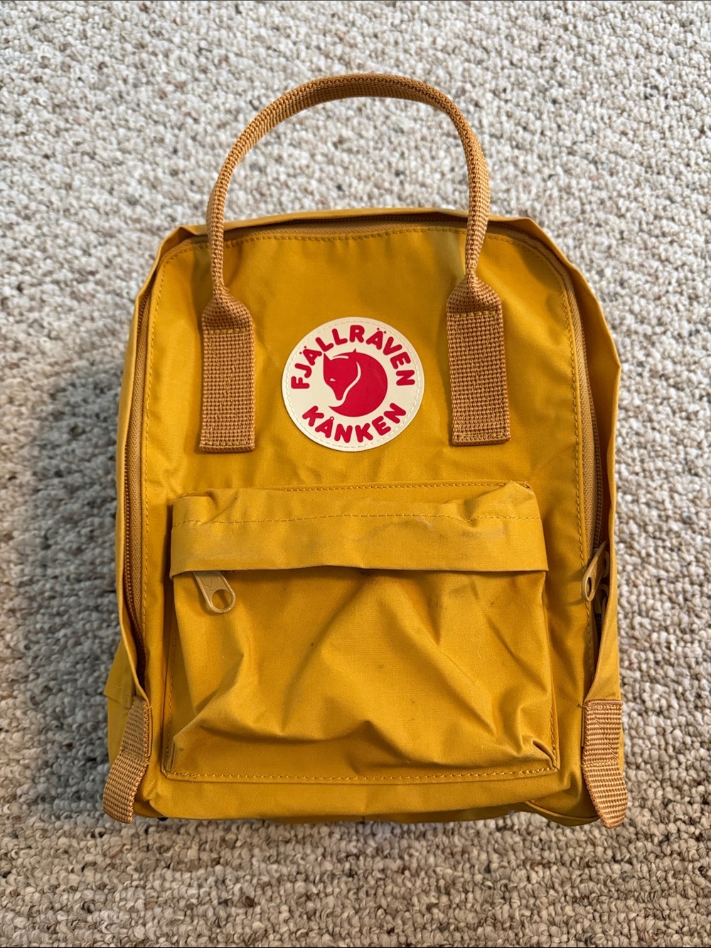 Fjallraven Kanken Kids Backpack in Mustard Yellow with Red Logo